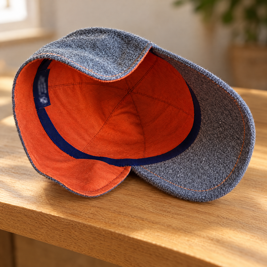Casquette laine grise surpiqûres orange – intérieur doublure orange